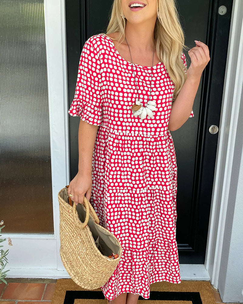 Vestido Midi de Lunares con Cuello Redondo Fluido